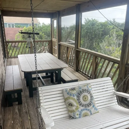 Three-bedroom house with views, decks, golf cart and home gym!