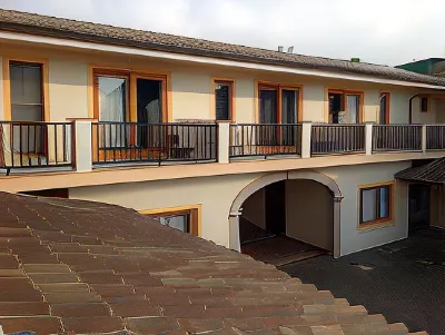 Club Esse Residence Capo d'Orso فنادق في بالاو