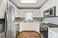 Spacious Home with Pool Hot Tub and Arcade Games . Great Quiet and Safe Location