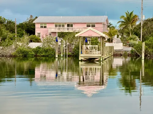Pink Bikini Island Cottage with a dock on Black Sound