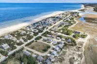Charming Seaside Cottage  Sleeps 9 with WiFi, AC, 2 Min Walk to a Private Beach