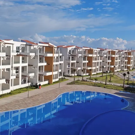 Light & Airy Family apartment with private pools & excellent local beaches