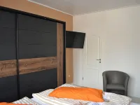 Holiday home in a quiet location in the center of Nordseebad Tossens Hotels in Tossens