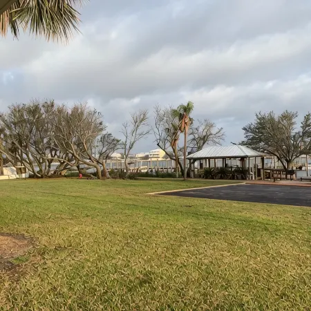 Ground floor condo with walk out access to docks, fishing piers and pool