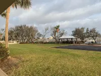 Ground floor condo with walk out access to docks, fishing piers and pool