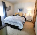 NEW! Renovated Bungalow steps from Lake Tomahawk - King Bed, Dock Space, Firepit