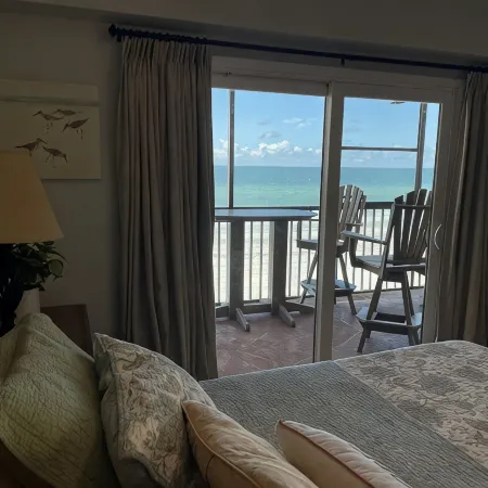 Luxury Beachfront Corner Condo 3 BR 2 BA with a Pool - It’s 5 o’clock somewhere!