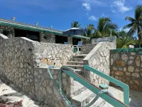 Beachfront views of pristine sandy beach, clear blue waters and surreal sunsets. - Wifi