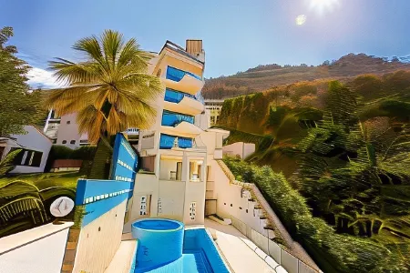 Meridian Hotel Отели рядом с достопримечательностью «Milocer beach»