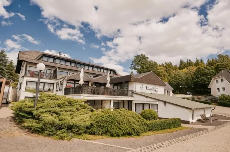 Hotel Parc Fermé Отели рядом с достопримечательностью «Cono's Paradise»