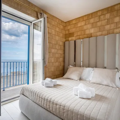 Terra | 2-Bedroom with Shared Kitchen & Balcony – Seafront Location Hotels near Grotta Piana