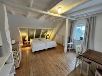 Kornboden vacation apartment in the Pilsumer Hof with a fantastic garden - Wifi