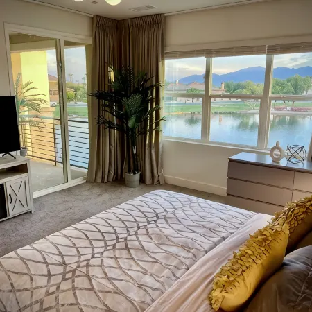 "Luxury Lakefront Paradise: Heated Pool Haven with Unrivaled Views"