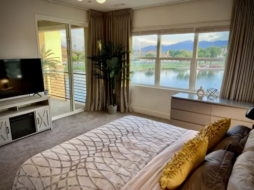 "Luxury Lakefront Paradise: Heated Pool Haven with Unrivaled Views"