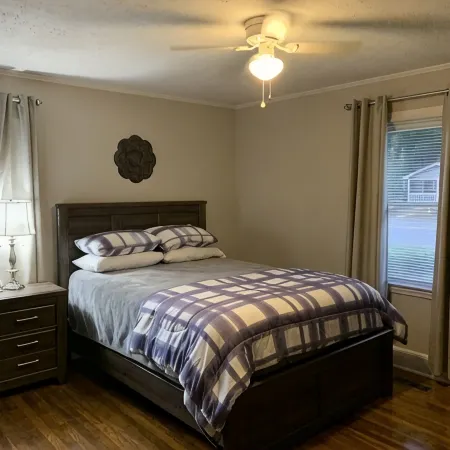 Charming house with a large fenced lot in a central location