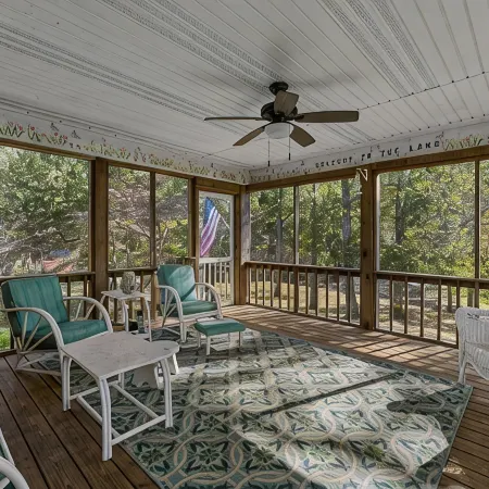 3 bedroom/2 full bath lakefront home with gentle slope to private covered dock