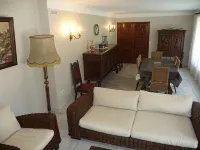 Spacious apartment in villa with large private garden and terrace near the sea