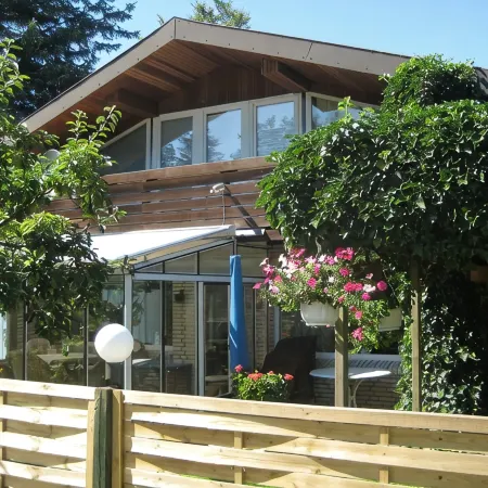 large apartment near the North Sea with conservatory, fireplace, sauna