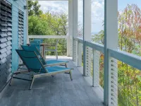 Verandah-style Living Overlooking Coral Bay Hotels in Central