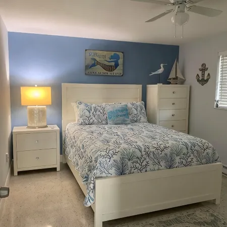 3 Minute walk to beautiful AMI beach! Old Florida Charm with a Modern Flair!