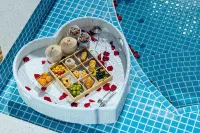 Cloud Dwelling Sky Pool Resort (Xishuangbanna West Shuangjing Xingguang Night Market Branch) - servizio colazione
