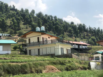 Memento Vivere Hotels near Surkanda Devi Temple