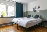 Botanika Uppsala Hotels near Tunabergsparken