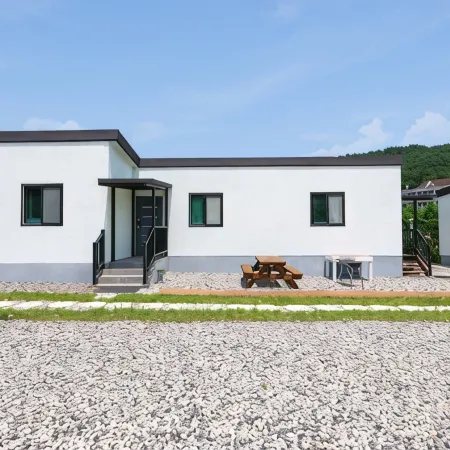 Gangneung Pogni Отели рядом с достопримечательностью «Парк Hourglass»