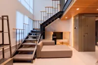 Industrial Modern 1BR Loft at Apartment Collins Boulevard By Travelio