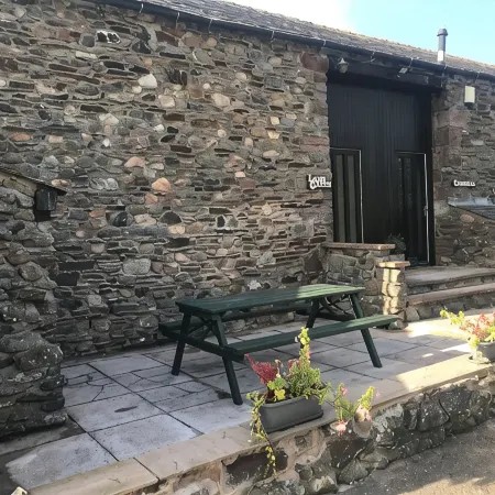 Rustic barn Cottage in a rural village with traditional open fireplace sleeps 5.