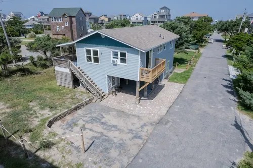 Only Five Steps From The Beach Access!