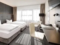 Victor's Residenz-Hotel Berlin Tegel Отели рядом с достопримечательностью «Веддинг»