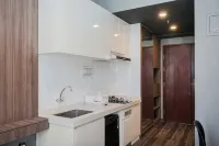 Good Designed and Cozy Studio at Sky House BSD Apartment By Travelio - Gym