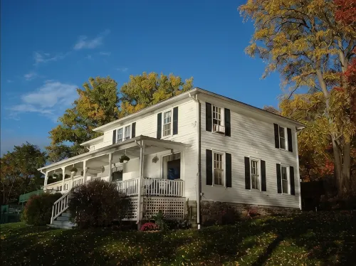 Beautiful House and Yard, Stunning View, 120' Lakefront, Covered Front Porch
