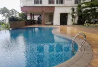 Modern and Relax Studio Room at Serpong Greenview Apartment by Travelio - Pools
