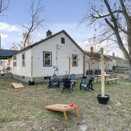 Urban Oasis: A Charming Downtown Retreat with Game Room, Firepit and Yard Games