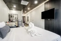 Melwood Suites Unit 104 Studio - Condos