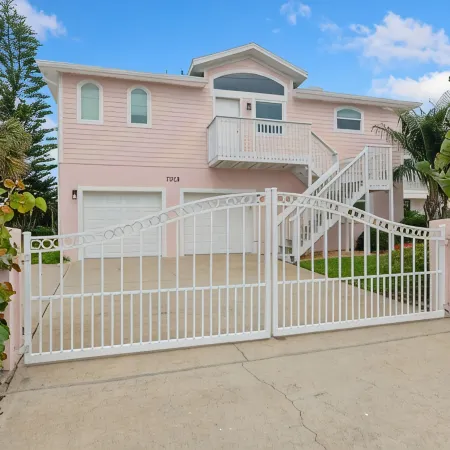Tropical Elegance Meets Coastal Adventure at This Stunning Oceanfront Retreat!