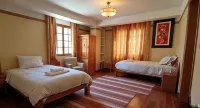 Tumy House B&B - Airport Shuttle