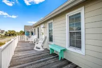 Comfortable, bright and sunny beach house.  Steps away from beach access.