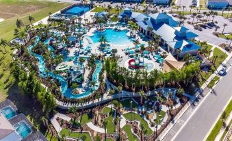 Sleeps 26 Resort Home w on-Site Waterpark Pool Flamingo Grove by AvantStay