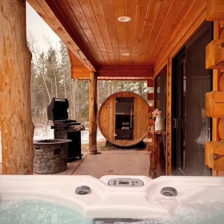Cozy Log Cabin w/ Private Lake & State Park Access! Jacuzzi, Sauna, Kayaks!