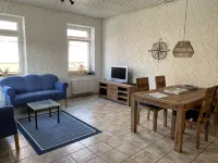 Vacation apartment "Seestern" with large garden in the heart of Pilsum - Homestays