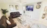 Beautiful Home in quiet neighborhood with a pool and close to stores & highways.