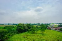 Cozy and Simple 1BR at Apartment Grand Sentraland Karawang By Travelio - Homestays