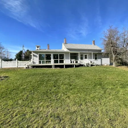 Rocky Branch Retreat on 33 acres with fenced yard, fireplaces & deck