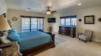 Riverfront with private dock, river views from every room & arcade games! - Wifi