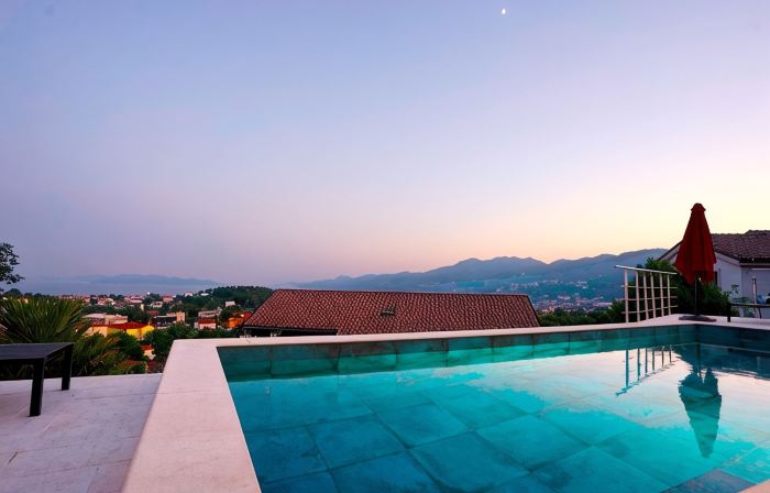 Exclusive vacation apartment near Opatija with 180° sea view and private pool.