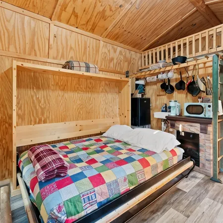 Big Mike's Cabin on the lake, next to ball diamonds nestled in 3 -cabin village
