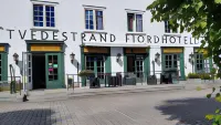 Tvedestrand Fjordhotell - Unike Hoteller فنادق في Tvedestrand